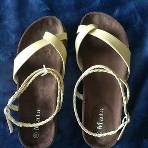 Beige crisscross sandals